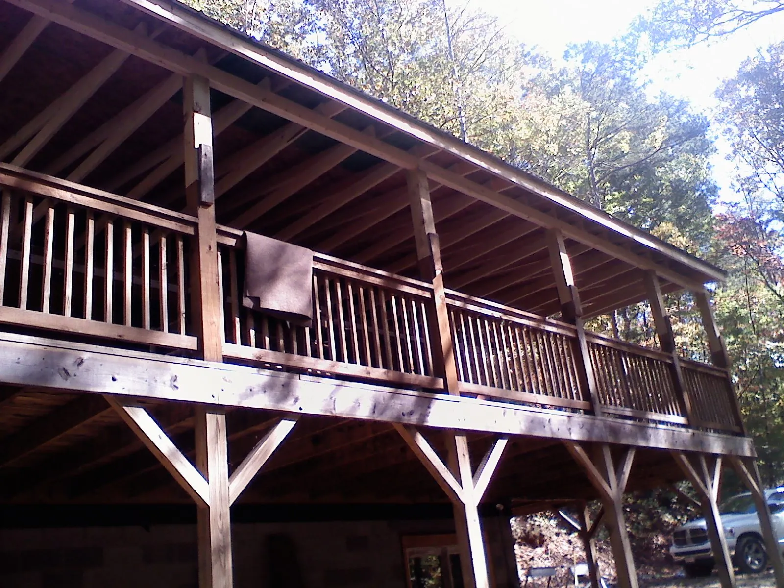 Timber framing under a new elevated porch and deck — Roof Leak Repair in Horatio by Roofing Brothers